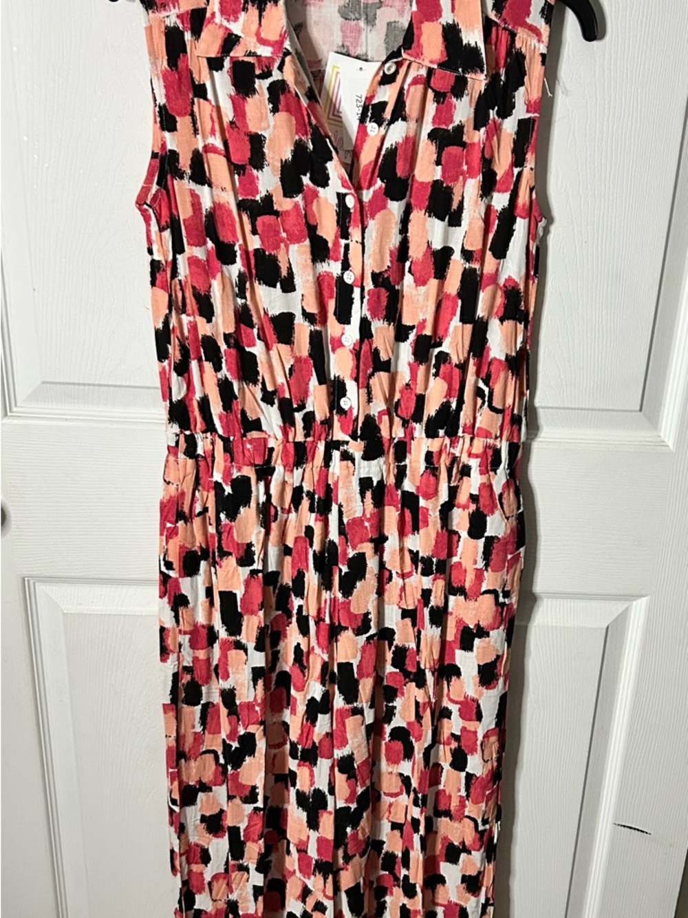 Lularoe “Kathy” Sleeveless Pink & Black Print jumpsuit